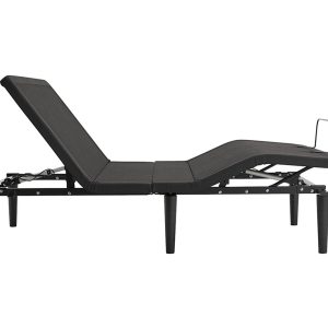 Man carefully examining a mattress at store