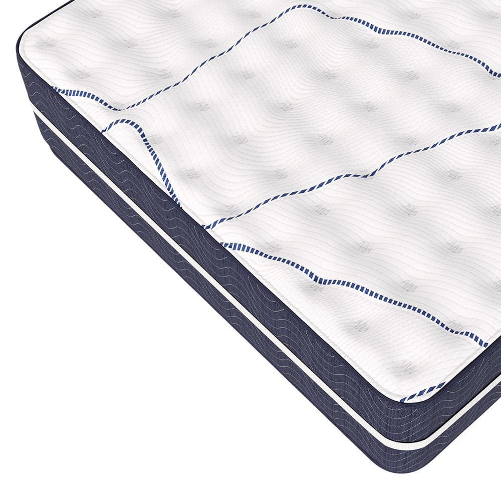 The Kinman Firm 2 Sided mattress features a thick, rectangular design with a white, textured top and dark blue sides. Blue wavy lines and small button-like tufts create a quilted look. It is designed to rotate and flip for durability.