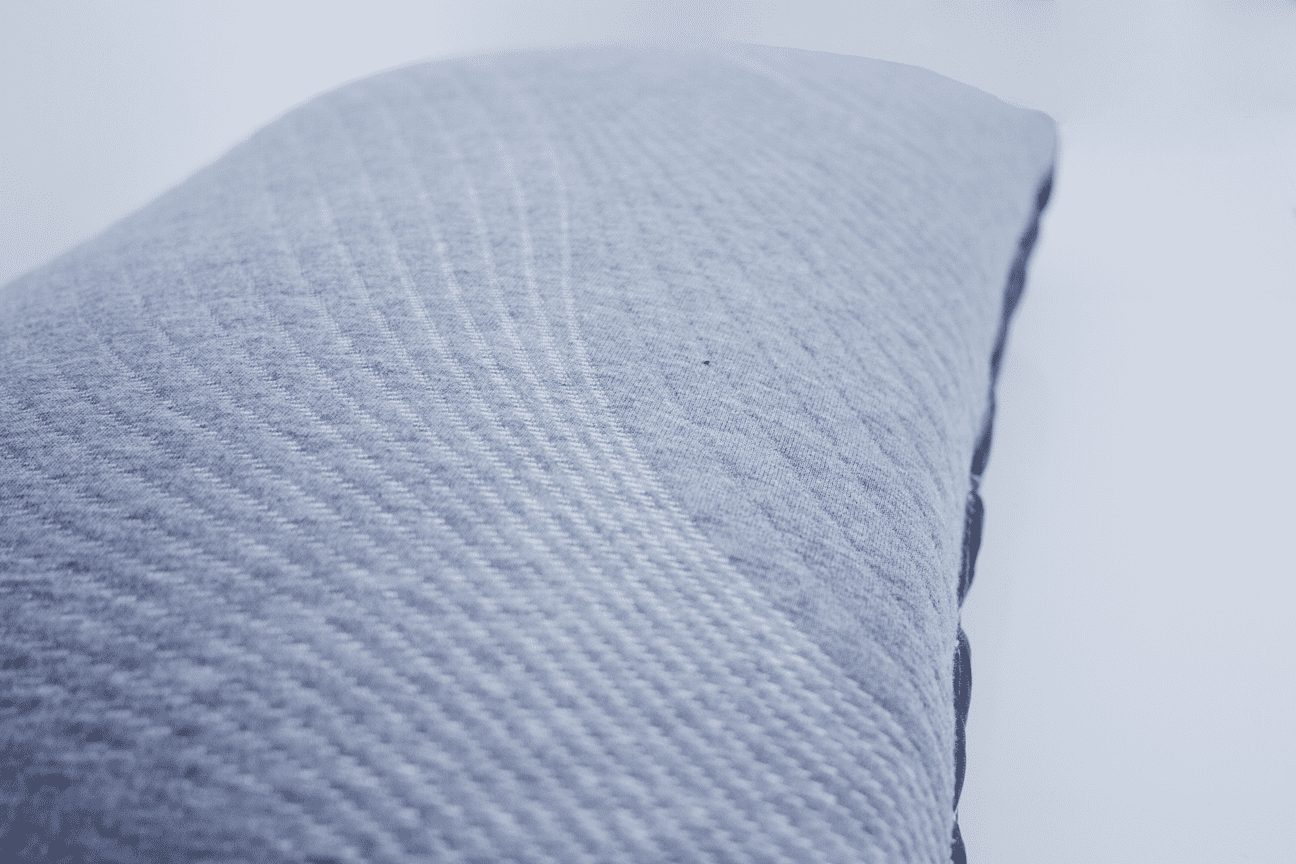 Close-up of textured gray fabric.