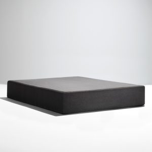 A minimalist, dark gray rectangular Southerland 9" Semi Flex Box Spring against a neutral, light gray background. The bed base is elevated slightly and casts a soft shadow on the surface it's placed on.