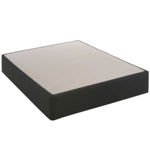 The Sealy SMB SX Box Spring Foundation is a rectangular box spring with a black upholstered frame and a plain off-white top, designed to provide sturdy support for a mattress. This foundation's simplistic design features clean lines and a solid base suitable for various bed styles.