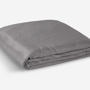 A neatly folded Cooling Blanket in solid gray lies flat against a white background, showcasing its geometric stitching patterns that provide a textured appearance.