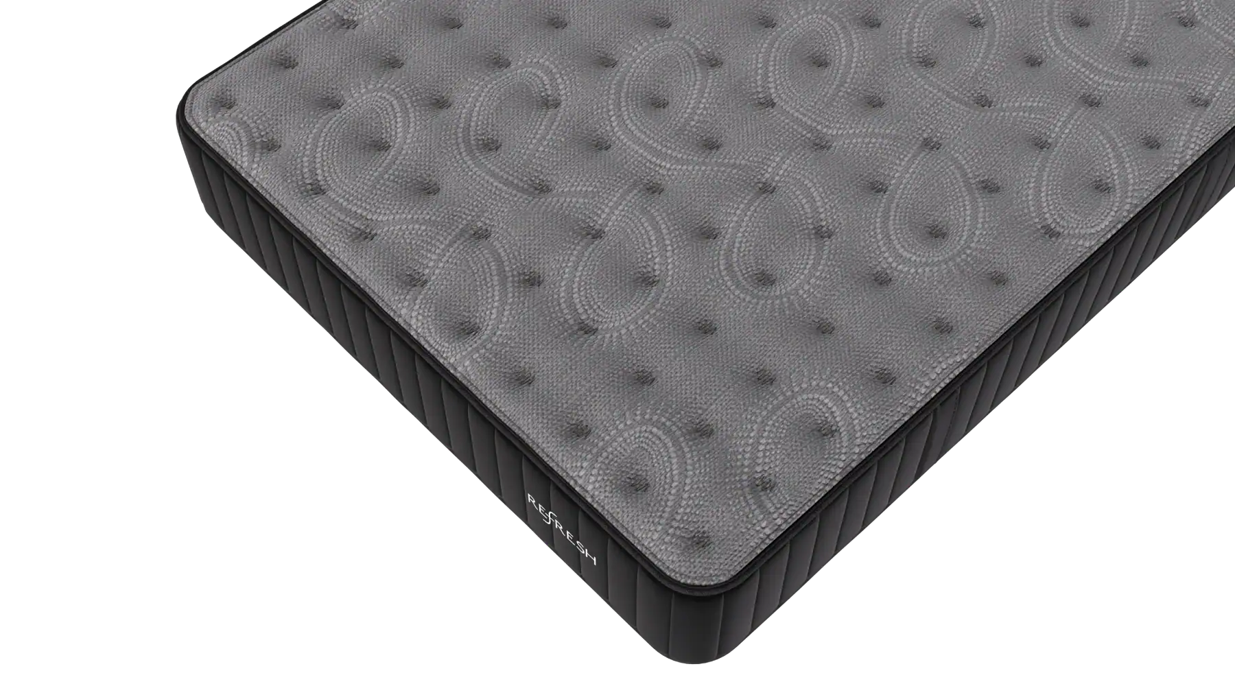 A close-up view of a gray, textured mattress with a patterned surface and black sides, photographed against a white background. The label "Serta" is visible on the side.