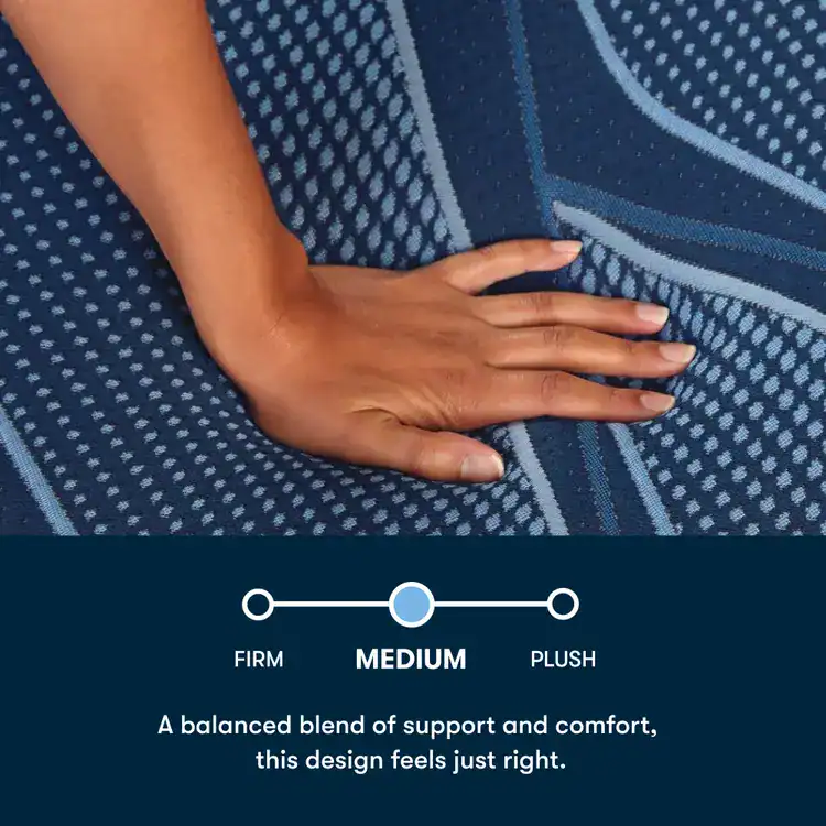 A hand presses down on the Serta iSeries NXG 3500 Hybrid — Medium mattress, featuring a textured blue surface. The firmness scale shows “Medium” between “Firm” and “Plush,” highlighting balanced support and comfort.