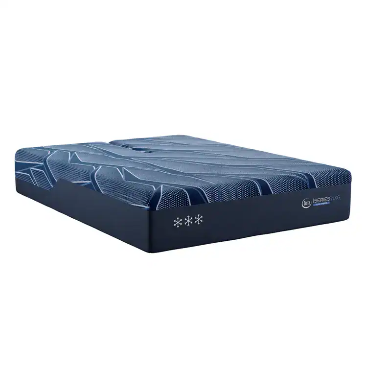 A dark blue, king-size Serta iSeries NXG 3500 Hybrid — Medium mattress with a textured geometric pattern, white snowflake symbols, and a corner label reading “iSeries KING.”.