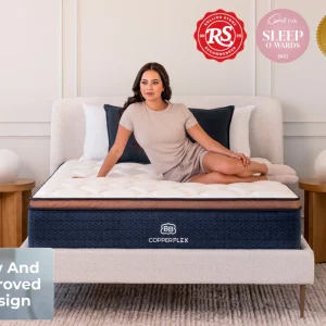 A woman sits on a modern bed with the CopperFlex Pro Hybrid 14" mattress. Award badges and a "New and Improved Design" label are displayed in the image.